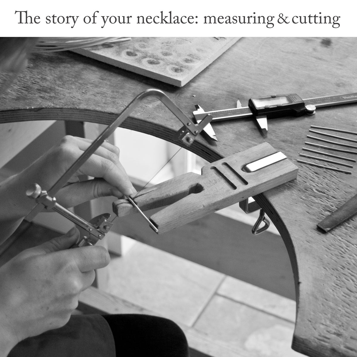 Close-up of silversmith using a pair of measuring callipers and a jewellers saw to cut several lengths of wire on a workbench with headline text &#39;The story of your necklace: measuring and cutting&#39;